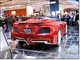  You can see the rear of the LF-A has a lot of interesting bits.  L-shaped taillights,  rear diffusor grills, and three exhaust pipes.  Yes, I know 10 cylinders don't go into three evenly.  Perhaps they lost one?